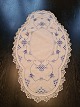 Table runs embroidered with blue fluted pattern Measures 44 x 78 cm. Appears with repair - ...