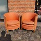 A pair of 
artdeco 
eacychairs from 
1930-1940 i 
beechwood.