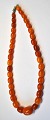 Fantastic amber chain with 37 polished oblong pieces, 19th century Denmark. Length: 36 ...