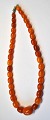 Fantastic amber 
chain with 37 
polished oblong 
pieces, 19th 
century 
Denmark. 
Length: 36 ...