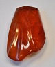 Large polished piece of amber, 19th century Denmark. 5.5 x 3.5 cm. Weight: 12.5 grams.The ...