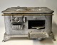 Techno stove, 20th century Denmark. Cast in aluminum. Highlighted 'Tekno' on oven door and motif ...