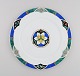 Limoges, France. Christian Dior "Dioricis" anniversary dish in porcelain. 1960s 
/ 70s.
