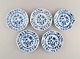 Five antique Stadt Meissen Blue Onion side plates in hand-painted porcelain. 
Early 20th century.
