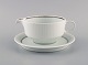 Tapio Wirkkala 
for Rosenthal. 
Rare Modulation 
sauce jug on 
stand in fluted 
porcelain. 
Platinum ...
