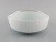 Tapio Wirkkala for Rosenthal. Rare Modulation bowl in fluted porcelain. Platinum 
Detail. Classic and timeless design. 1960s.
