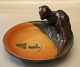 1 pcs in stock
219 XVI Tray 
with otter and 
fish 15 cm Axel 
Sorensen  1939
 P. Ipsen Enke 
(The ...