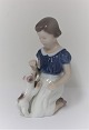 Bing & Grondahl. Porcelain figure. Girl with dog. Model 2316. Height 13 cm. (1 quality)