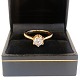 A diamond ring 
set with a 
brillant-cut 
diamond app. 
0,85 ct. 
mounted in 14k 
gold. Colour: 
Top ...