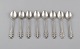 Eight Georg Jensen Lily of the Valley coffee spoons in sterling silver. Dated 
1933-1944.
