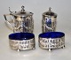 Salt, pepper - 
mustard set, 
20th century 
England. 
Silver-plated 
with blue 
glass. 4 parts.
NB: ...