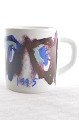 Royal 
Copenhagen 
faience. Annual 
mug from 1995. 
Fine condition. 
Height 7 cm. 2 
3/4 inches.  
...