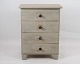 A small Gustavian gray painted chest of drawers with original paint from around the year 1840s. ...