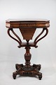 An antique mahogany sewing table on a pillar from around the year 1840s. Is in nice original ...
