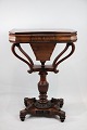 An antique 
mahogany sewing 
table on a 
pillar from 
around the year 
1840s. Is in 
nice original 
...