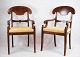 A set of 
mahogany 
armchairs with 
light fabric 
from around the 
year 1860. 
Stands in fine 
...