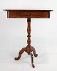 A side table on a mahogany pillar from around the year 1850s. Stands in very nice hand-polished ...