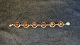 Elegant 
Bracelet with 
Amber in Silver
Stamped EF
Length 21 cm
Nice and well 
maintained 
condition