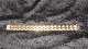 Elegant 
Bracelet 18 
carat gold
Stamped 750
Length 18.5 cm
Width 16.20 mm
Thickness 2.57 
...