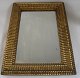 Baroque frame 
with mirror 
glass, 18th 
century. 58 x 
40 cm.