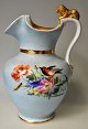 Lion chocolate 
jug in 
porcelain, 19th 
century 
Germany. White 
hand painted 
porcelain with 
flowers ...