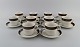 Hertha 
Bengtsson 
(1917-1993) for 
Rörstrand. 10 
Koka coffee 
cups with 
saucers in 
glazed ...
