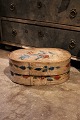 Swedish 1800 
century oval 
wooden box with 
original paint 
with floral 
motif and with 
a really ...