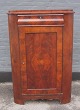 Late-empire  corner cabinet in mahogany, ca.1860, Denmark. With drawer at the top and door with ...