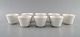 Wilhelm Kåge 
for 
Gustavsberg. 
Eight herb pots 
in white glazed 
porcelain. 
Swedish design, 
...
