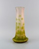 Large Emile 
Gallé vase in 
frosted and 
green art glass 
carved in the 
form of 
thistles. Early 
20th ...