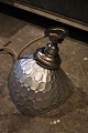 Old shop spot with lampshade in glass, silver-painted outside and with poor man's silver inside. ...