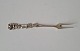 Silver fork 
decorated with 
rose
Stamped 830
Length 12.8 
cm.