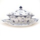 Royal Copenhagen blue fluted half lace tureen. 1. quality. #600 & #702. Nice 
condition. H: 25cm. L: 50cm