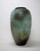 Wilhelm & Elly Kuch, Germany. Colossal floor vase in glazed ceramics. Beautiful 
glaze in turquoise and dark shades. 1960s.

