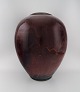 Maxence 
Jourdain. 
French 
contemporary 
ceramicist. 
Colossal unique 
floor vase in 
glazed ...