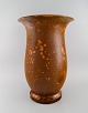 Svend Hammershøi (1873-1948) for Kähler. Very large floor vase in glazed 
ceramics. Beautiful orange uranium glaze. 1930s / 40s.
