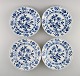 Four antique Meissen Blue Onion dinner plates in hand-painted porcelain. Early 
20th century.
