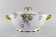 Rosenthal, Germany. Large Iris lidded tureen in hand-painted porcelain with 
flowers and gold edge. Handles modeled as foliage. 1920s.
