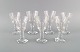 Baccarat, France. Seven art deco white wine glasses in clear mouth-blown crystal 
glass. 1930s.
