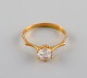 Scandinavian jeweler. Vintage ring in 21 carat gold adorned with brilliant. 
1920/30