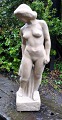 Danish artist (20th century): Standing female model. Cement stone. Signed. AB. Height .: 49 ...