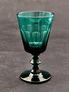 Dark green wine glass