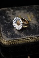Georg Jensen Marguerite ring in gold-plated sterling silver and white enamel. Ring size:51. ...