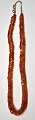 Completely unique amber chain with 85 polished pieces, 20th century Denmark. The pieces are ...