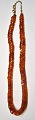 Completely 
unique amber 
chain with 85 
polished 
pieces, 20th 
century 
Denmark. The 
pieces are ...