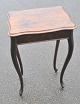 Nyrococo sewing table in mahogany, 19th century Denmark. With capriole legs. Folding plate, ...
