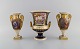 Three antique empire vases in hand-painted porcelain. Religious motifs, flowers 
and gold decoration. 19th century.
