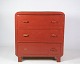 Small chest of drawers with red paint from around the year 1940s.Dimensions in cm: H: 63 W: 60 ...