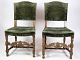 2 oak chairs in 
Renaissance 
style 
upholstered 
with green 
velor fabric 
from around the 
...