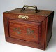 Chinese mahjong 
game, 19th 
century. In box 
of precious 
wood with 
fittings and 
handles in 
brass. ...